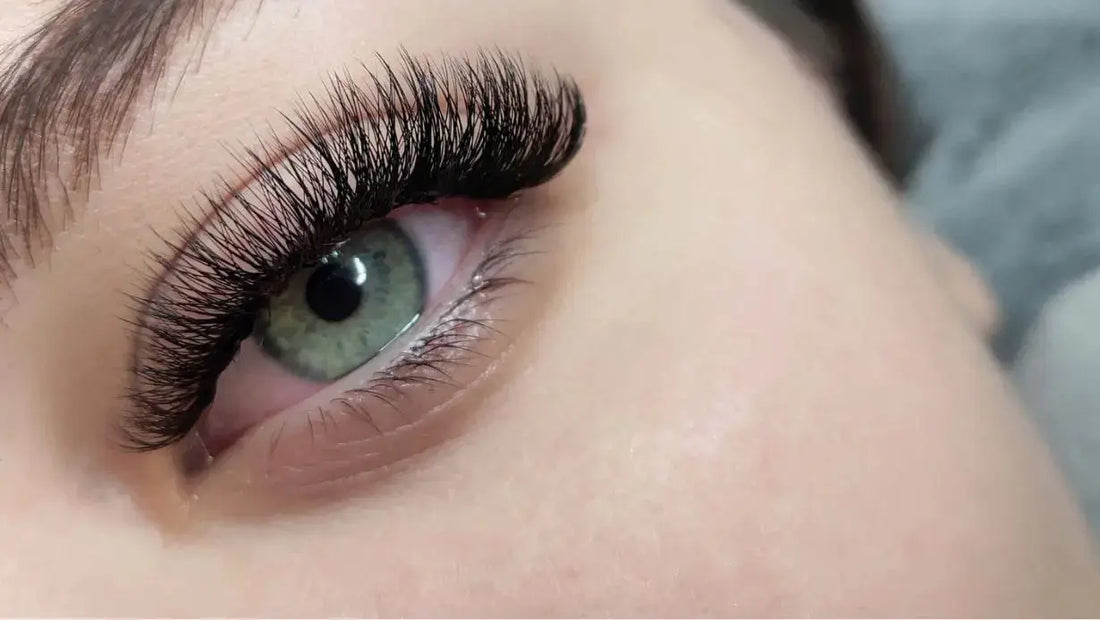 Close-up of beautifully applied lash extensions - guide to protecting eyelash extensions overnight by sleeping on a Lunelle silk pillowcase